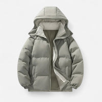 Manteau matelassé court à capuchon