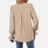 Blouse fluide à manches bouffantes
