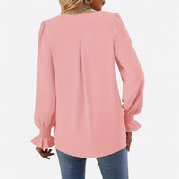 Blouse fluide à manches bouffantes