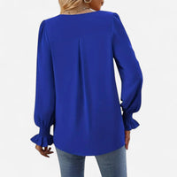 Blouse fluide à manches bouffantes