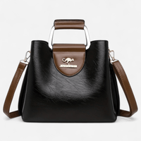 Sac à main rigide en cuir