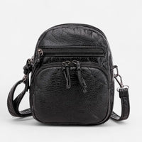 Sac à bandoulière en cuir compact