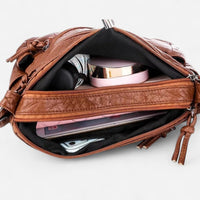 Sac à bandoulière en cuir souple multipoches