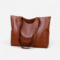 Sac fourre-tout en cuir à poches latérales