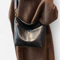Sac seau en cuir à sangle brodée